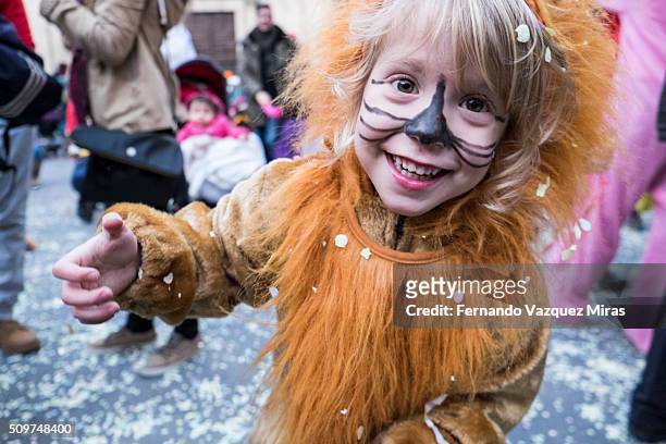 caucasian girl dress up as lion looking at the camera.. - fiesta stock pictures, royalty-free photos & images