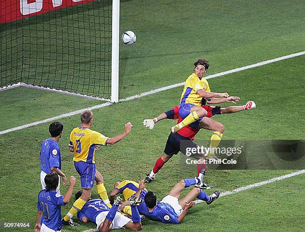 Zlaten Ibrahimovic of Sweden scores the equiliser against Italy during the UEFA Euro 2004 Group C match between Italy and Sweden at the Estadio...