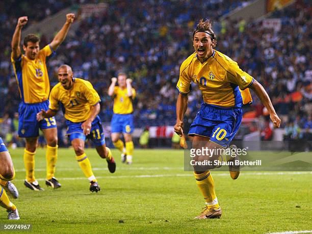 Zlatan Ibrahimovic of Sweden celebrates scoring their first goal during the UEFA Euro 2004 Group C match between Italy and Sweden at the Estadio...
