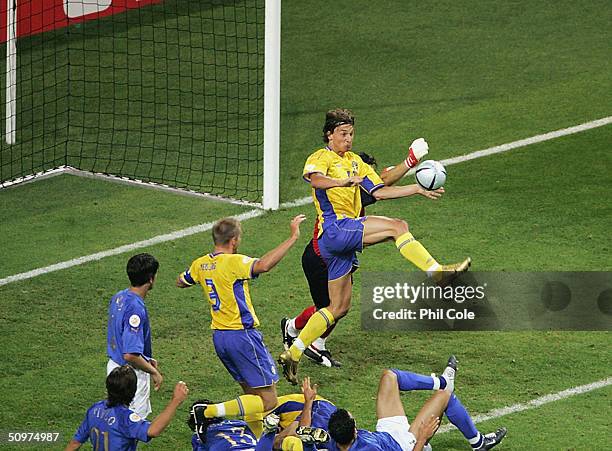 Zlaten Ibrahimovic of Sweden scores the equiliser against Italy during the UEFA Euro 2004 Group C match between Italy and Sweden at the Estadio...