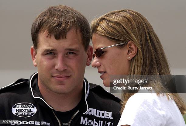 Ryan Newman, driver of the Penske Racing Dodge and his wife Krissie, during practice for the DHL 400 on June 18, 2004 at Michigan International...