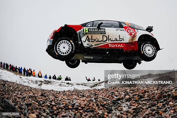 Craig Breen of Ireland and his co-driver Scott Martin of Britain steer their Citroen DS3 WRC during the 2nd stage of the Rally Sweden, second round...