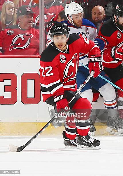 Jordin Tootoo of the New Jersey Devils plays the puck during the game against the Edmonton Oilers at the Prudential Center on February 9, 2016 in...
