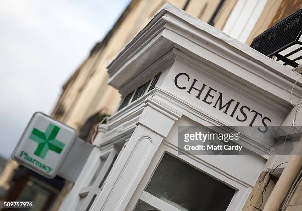 Pharmacy sign is displayed outside a independent chemist shop on February 12, 2016 in Bath, England. One in four high street pharmacies could close...