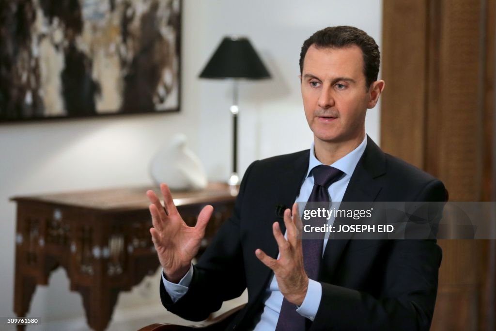 TOPSHOT-SYRIA-CONFLICT-ASSAD