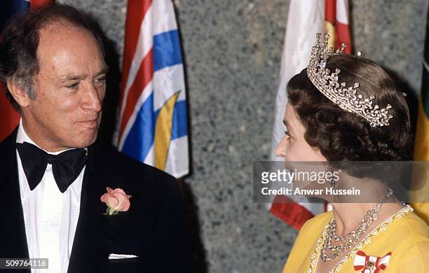 Queen Elizabeth ll and Canadian Prime Minister Pierre Trudeau attend a banquet on August 01, circa 1976 in Canada.