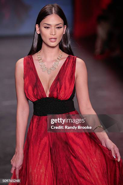 Miss Universe 2015 Pia Alonzo Wurtzbach walks the runway at The American Heart Association's Go Red For Women Red Dress Collection 2016 Presented By...