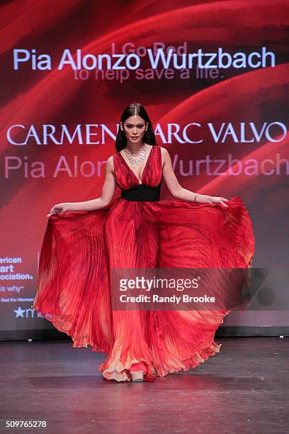 Miss Universe 2015 Pia Alonzo Wurtzbach walks the runway at The American Heart Association's Go Red For Women Red Dress Collection 2016 Presented By...
