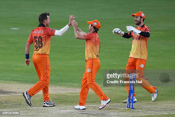 Brett Lee of Virgo Super Kings celebrates the wicket of Neil Carter of Leo Lions with his team-mates during the Oxigen Masters Champions League Semi...