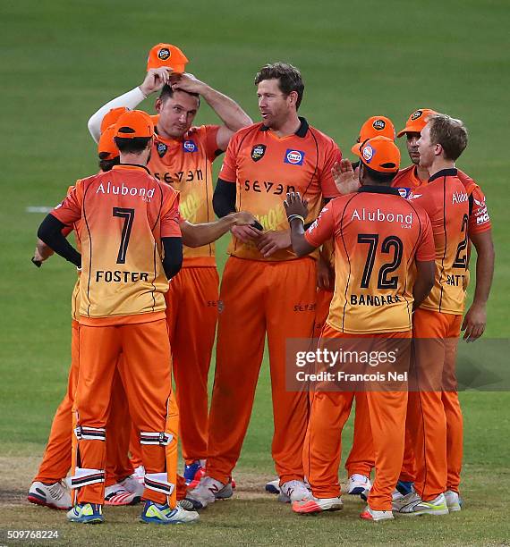 Jacob Oram of Virgo Super Kings celebrates with his team-mates after dismissing Hamish Marshall of Leo Lions during the Oxigen Masters Champions...