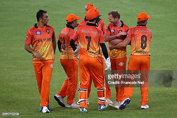 Azhar Mahmood and Gareth Batty of Virgo Super Kings celebrate the wicket of Brian Lara of Leo Lions during the Oxigen Masters Champions League Semi...