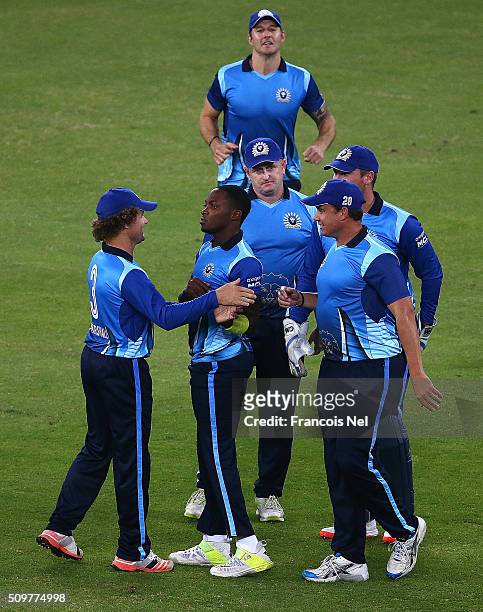 Fidel Edwards of Leo Lions celebrates the wicket of Humayun Farhat of Virgo Super Kings with his team-mates during the Oxigen Masters Champions...