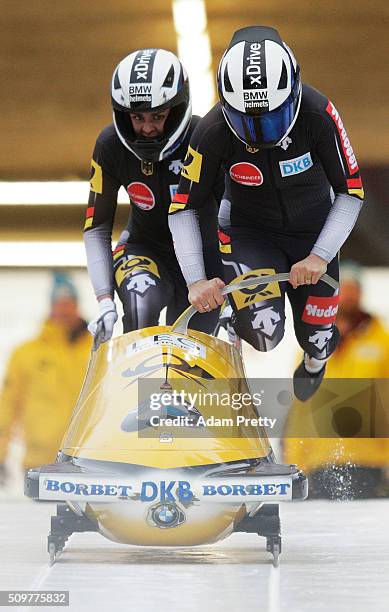 Anja Schneiderheinze and Annika Drazek of Germany push their Bob off the start during during Day 1 of the IBSF World Championships for Bob and...