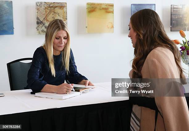 Gwyneth Paltrow signs her book 'It's all Good' during the the 2016 Antiques And Garden Show Of Nashville at Music City Center on February 12, 2016 in...