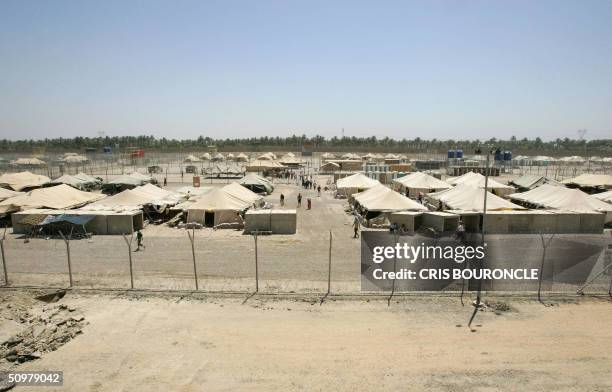 Military review board plays jury to Iraq's 6,000 detainees by Ned Parker A panoramic view of Camp Redemption holding a vast majority of the 3,100...