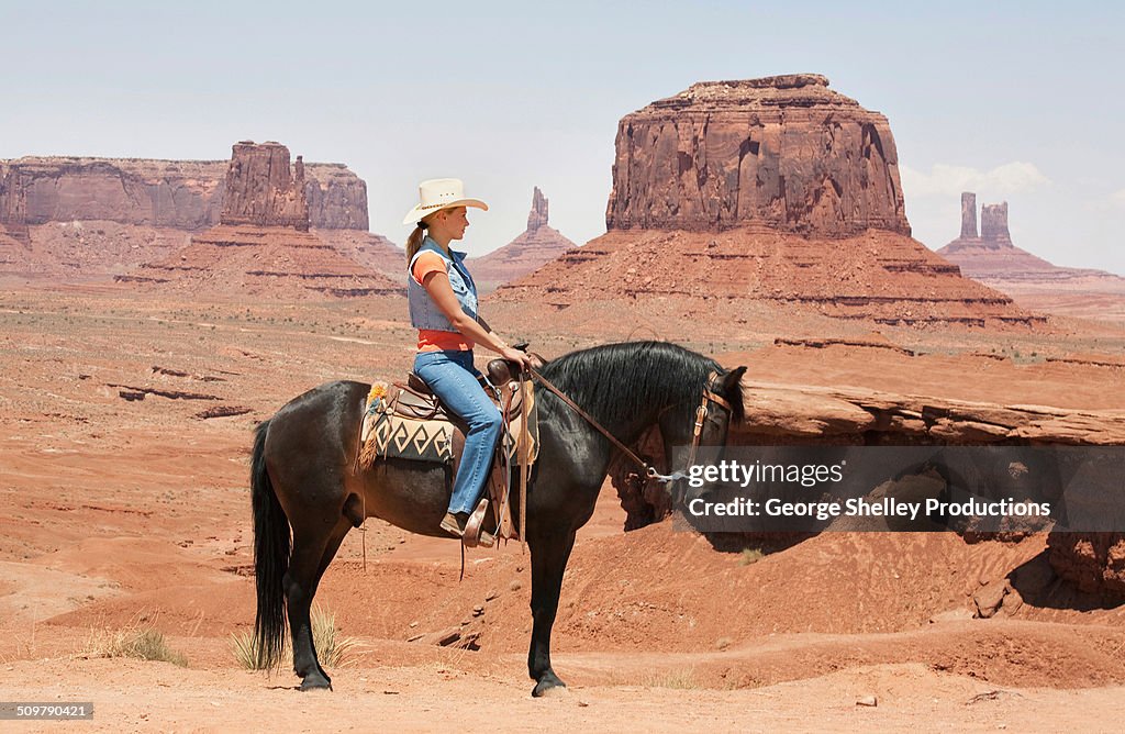 Cowgirl on John Ford point in Monument Valley