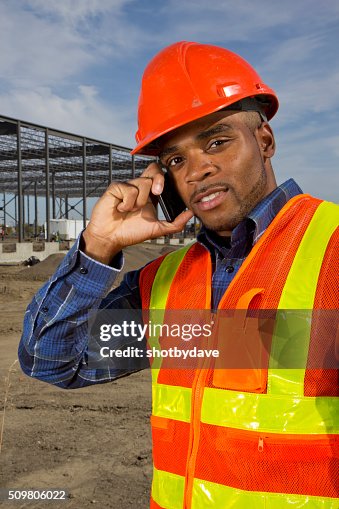 Engineer Calling Construction Engineer Makeing A Phone Call At A Work Site High-Res ...