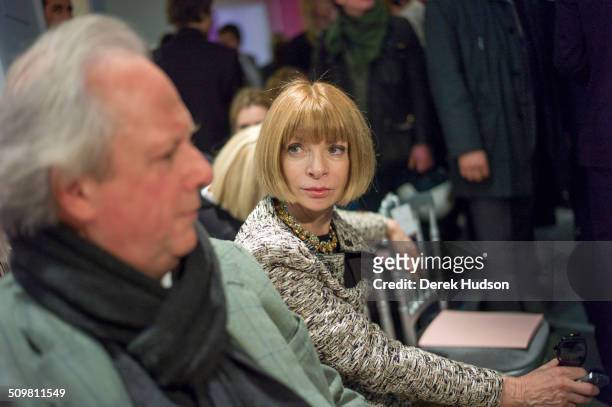 View of Vanity Fair editors Graydon Carter and Anna Wintour as they attend a Christian Dior fashion show, Paris, France, 2010.