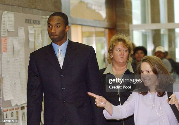 Los Angels Lakers star guard Kobe Bryant arrives with his attorney Pamela Mackey for two days of hearings at the Eagle County Justice Center June 21,...