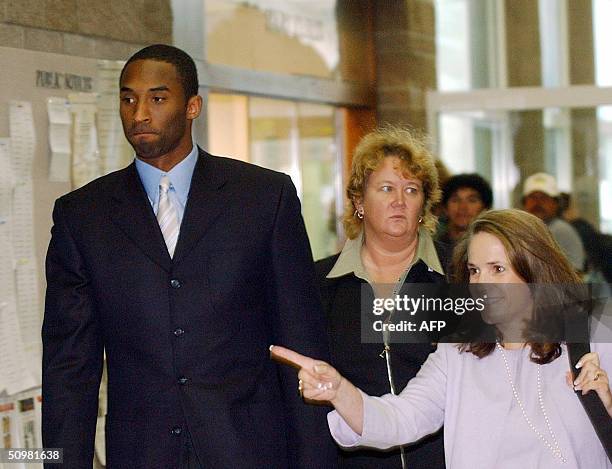 Los Angeles Lakers star guard Kobe Bryant arrives with his attorney Pamela Mackey for two days of hearings at the Eagle County Justice Center June...