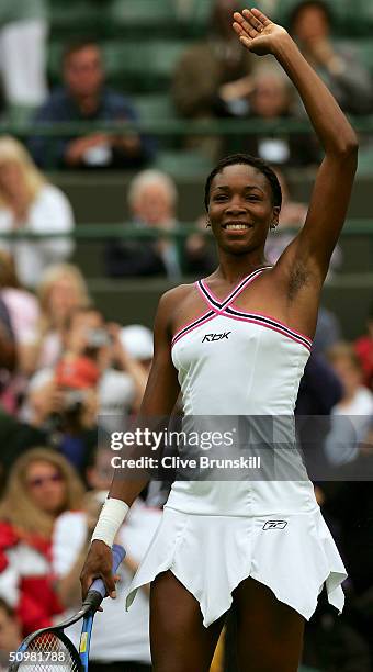 Venus Williams of USA celebrates after she won against Marie-Gayanay Mikaelian of Switzerland in their first round match at the Wimbledon Lawn Tennis...