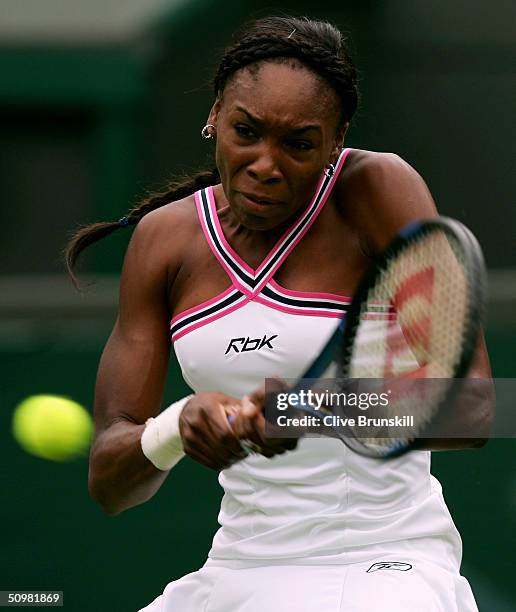 Venus Williams of USA in action during her first round match against Marie-Gayanay Mikaelian of Switzerland at the Wimbledon Lawn Tennis Championship...
