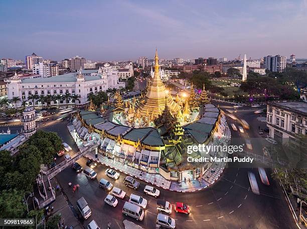 myanmar, yangon, sule pagoda at sunset - burma stock pictures, royalty-free photos & images