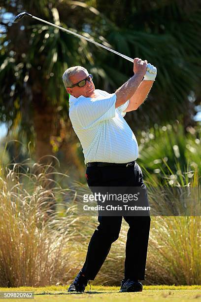Fuzzy Zoeller hits a tee shot on the second hole during the first round of the 2016 Chubb Classic at the TwinEagles Club on February 12, 2016 in...
