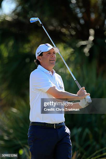 Billy Andrade hits a tee shot on the second hole during the first round of the 2016 Chubb Classic at the TwinEagles Club on February 12, 2016 in...