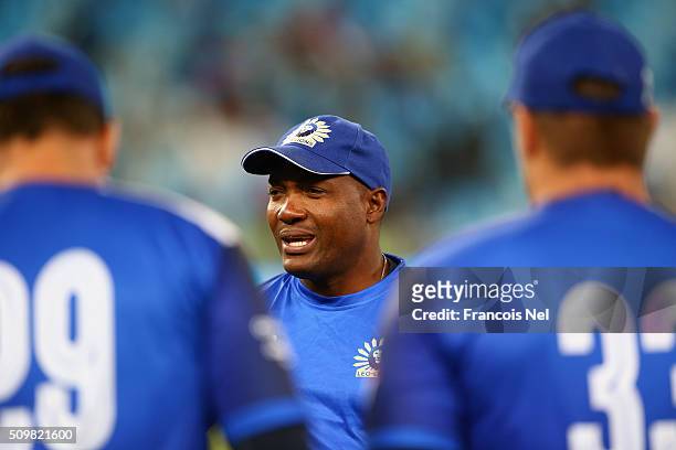 Brian Lara of Leo Lions speaks with team-mates during the Oxigen Masters Champions League Semi Final match between Leo Lions and Virgo Super Kings at...