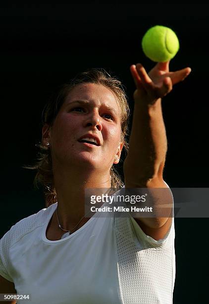 Lubomira Kurhajcova of Slovakia in action during her first round match against Anastasia Myskina of Russia at the Wimbledon Lawn Tennis Championship...