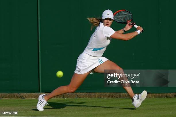 Alicia Molik of Australia in action during her first round match against Melinda Czink of Hungary at the Wimbledon Lawn Tennis Championship on June...