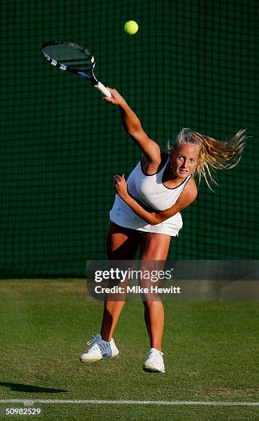 Emily Webley-Smith of Great Britain in action during her first round match against Severine Beltrame of France at the Wimbledon Lawn Tennis...