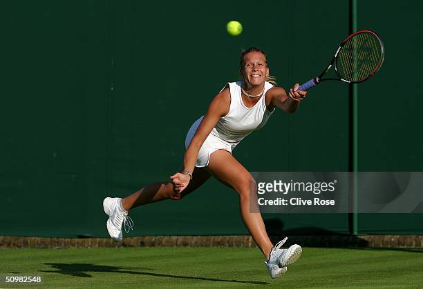 Melinda Czink of Hungary in action during her first round match against Alicia Molik of Australia at the Wimbledon Lawn Tennis Championship on June...
