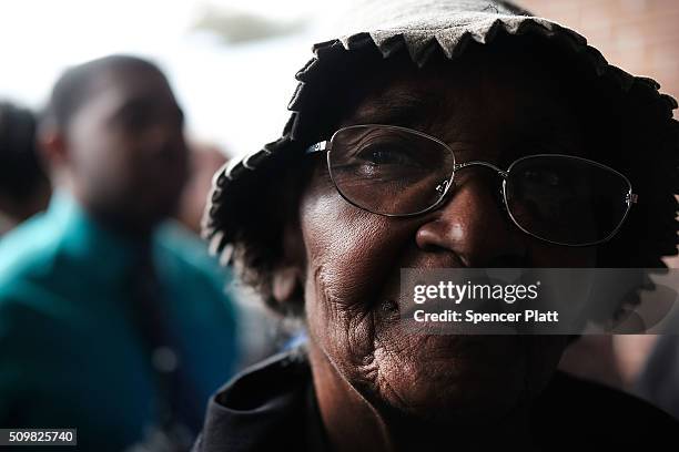 Resident Jasie Kinard waits to get into a school to see Democratic presidential candidate Hillary Clinton speak in South Carolina a day after her...