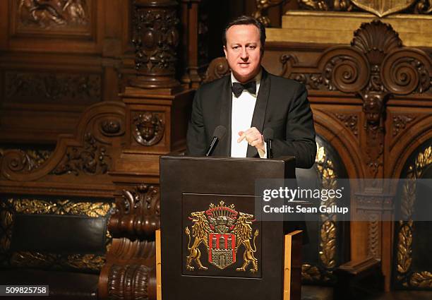 British Prime Minister David Cameron speaks at the annual Matthiae-Mahl dinner at Hamburg City Hall on February 12, 2016 in Hamburg, Germany. Cameron...