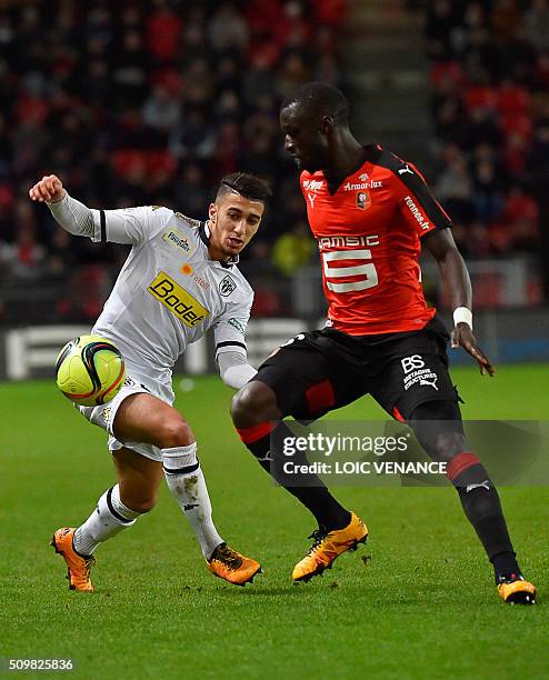 Angers' Algerian defender Said Benrahma fights for the ball with Rennes' French-Senegalese defender Cheik M'bengue during the French L1 football...