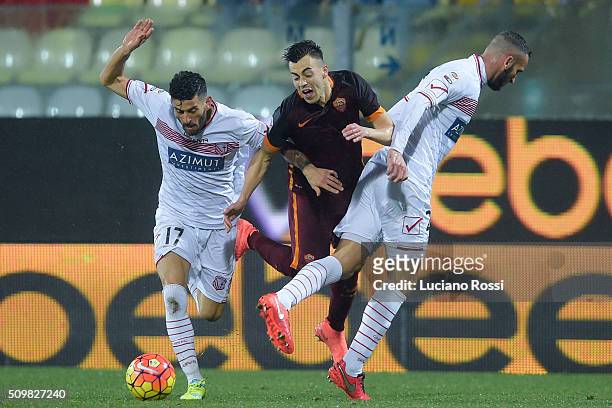 Roma player Stephan El Shaarawy is challenged by Carpi FC players Marco Crimi and Emanuele Suagher during the Serie A match between Carpi FC and AS...