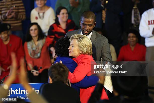 Democratic presidential candidate Hillary Clinton greets District Superintendent Dr. Thelma Sojourner before speaking to voters in South Carolina a...