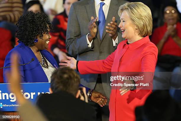 Democratic presidential candidate Hillary Clinton greets District Superintendent Dr. Thelma Sojourner before speaking to voters in South Carolina a...