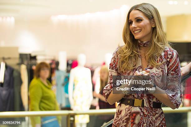 Olivia Palermo waves to fans as she promotes her new collection at Nordstrom Northpark on February 12, 2016 in Dallas, Texas.