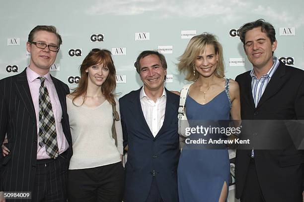 Karl Hermann, Robin, Thierry Chaunu, Ana Malova, and Pete Hunsinger pose during the "Roof Is On Fire" party at the Gansevoort Hotel on June 21, 2004...