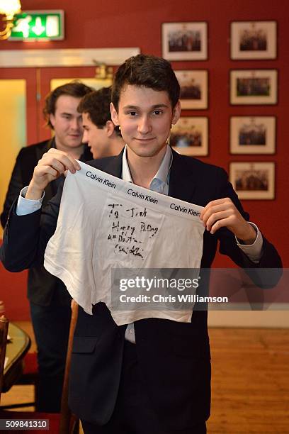 Student shows boxers signed by Calvin Klein before his address to the Cambridge Union at The Cambridge Union on February 12, 2016 in Cambridge,...