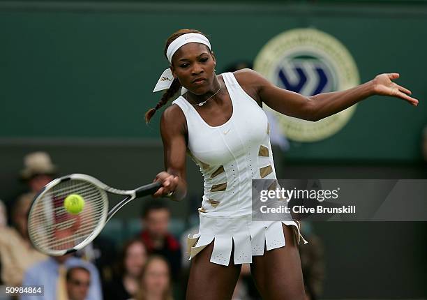 Serena Williams of USA in action during her first round match against Jie Zheng of China at the Wimbledon Lawn Tennis Championship on June 22, 2004...