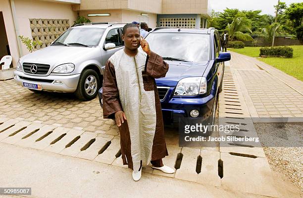 Guillaume Soro, Secretary General of the New Force talks on the phone at his house May 2, 2004 in Bouake, Ivory Coast. The New Force now controls the...