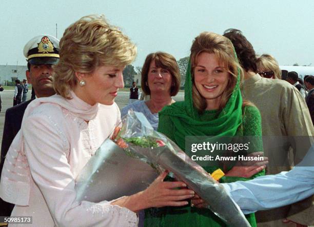 Diana, Princess of Wales, is welcomed to Lahore by Imran and Jemima Khan at Lahore airport April, 1996 in Lahore, Pakistan. Imran Khan and Jemima...