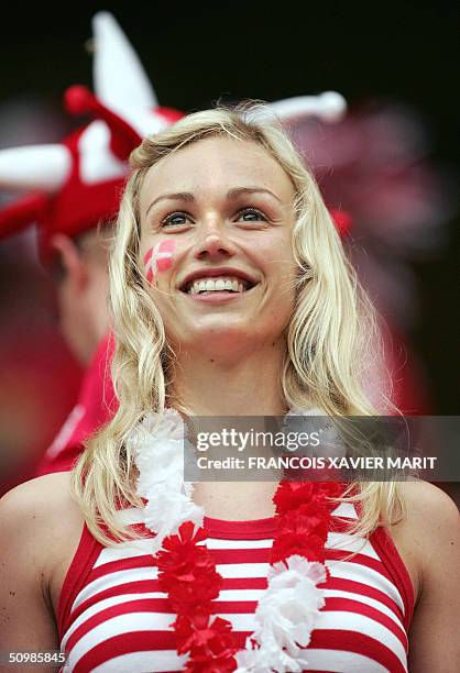 Danish fan smiles, 22 June 2004 before their European Nations football championships match against Sweden at the Bessa stadium in Porto. Denmark and...