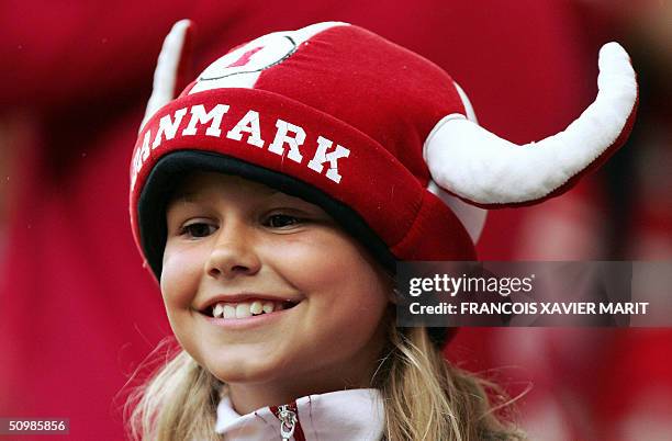 Danish fan smiles, 22 June 2004 before their European Nations football championships match against Sweden at the Bessa stadium in Porto. Denmark and...