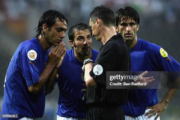 Marco Materazzi, Alessandro Del Piero and Christian Panucci of Italy appeal to the referee Valentin Ivanov over the penalty decision during the UEFA...