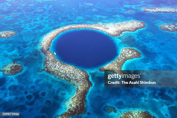 In this aerial image, the great blue hole is seen on September 29, 2005 in Ambergris Caye, Belize.